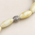 Kahrab Ivory Filigree Bead Bracelet